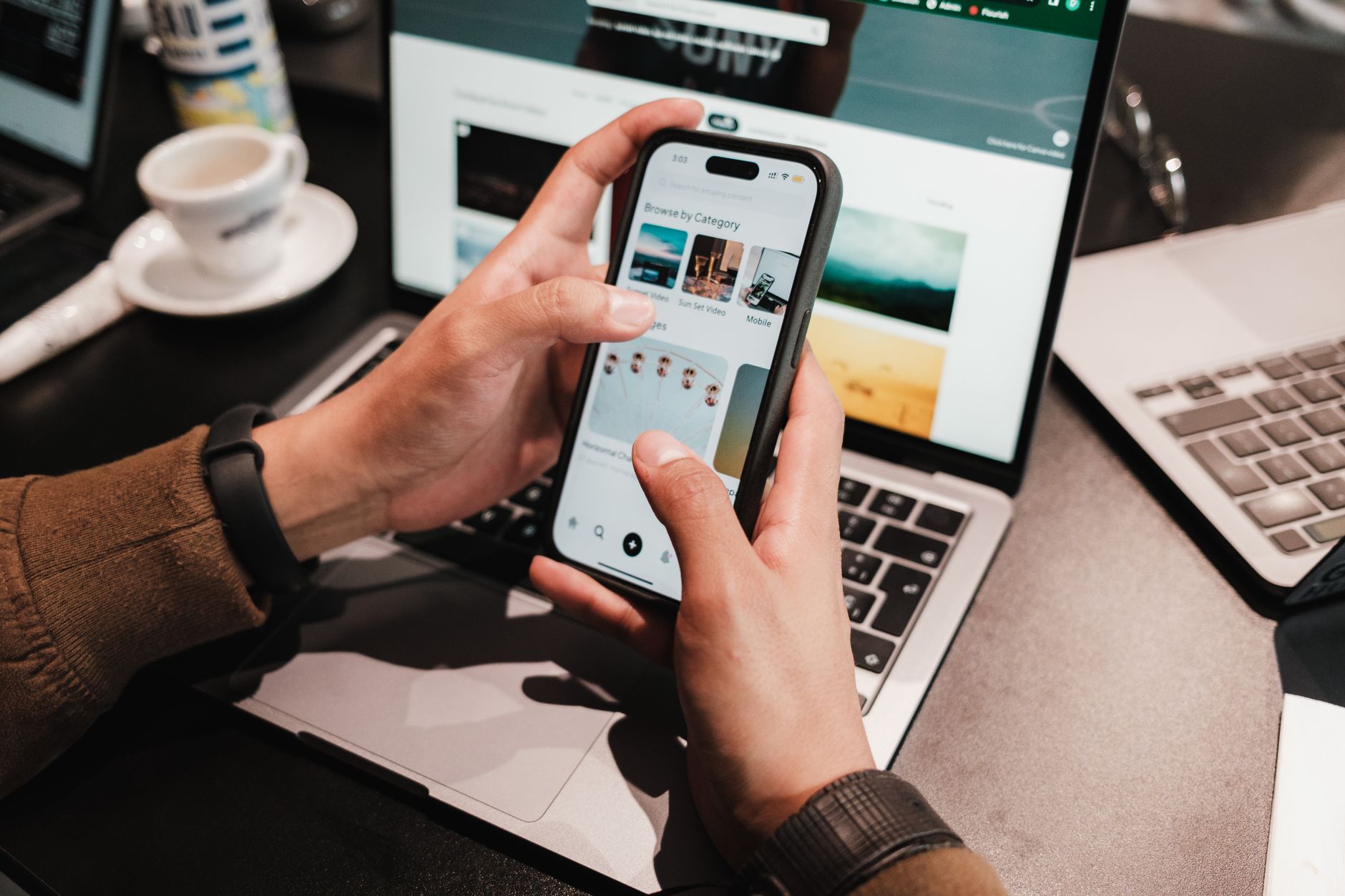 Person using reverse image search on a smartphone to verify a social media profile photo.